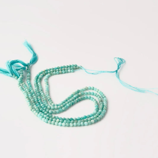 Authentic Amazonite gemstone beads in 3.4–3.5mm faceted rondelles with bright aqua‑blue shine for DIY jewellery makers.
