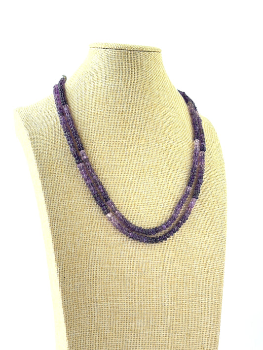 Layered amethyst necklace crafted from carved pumpkin beads with adjustable fit.