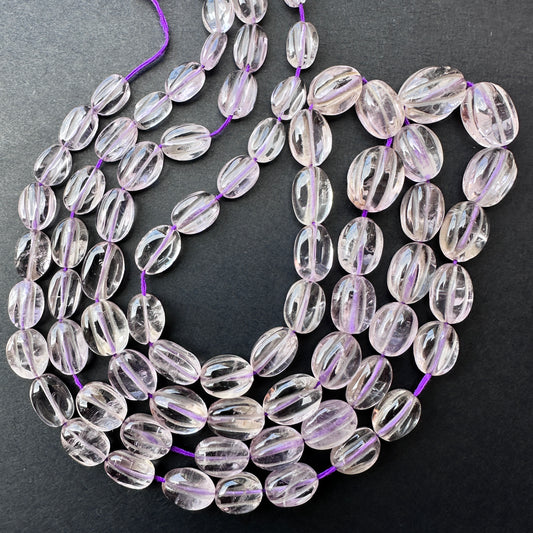 Amethyst stone beads in smooth oval cut with rich purple tones for handmade jewellery components.
