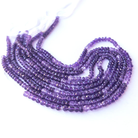 Natural Amethyst faceted rondelle stone beads showing rich purple tones and uniform 4.5–5mm sizing for DIY jewellery.