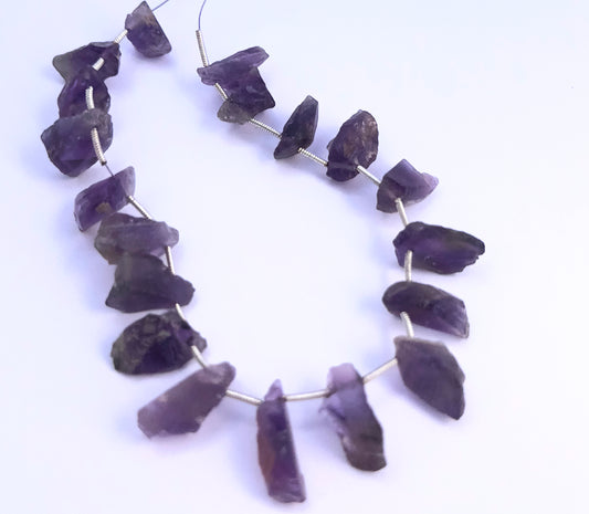 Amethyst rough on white background.