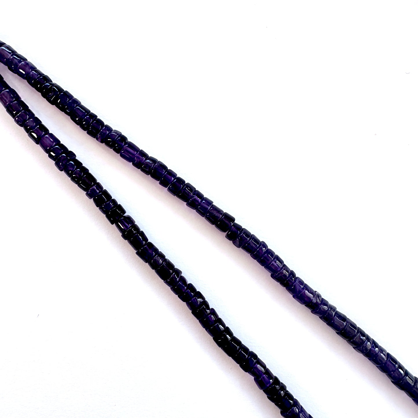 Amethyst stone beads with polished finish and rich colour saturation.