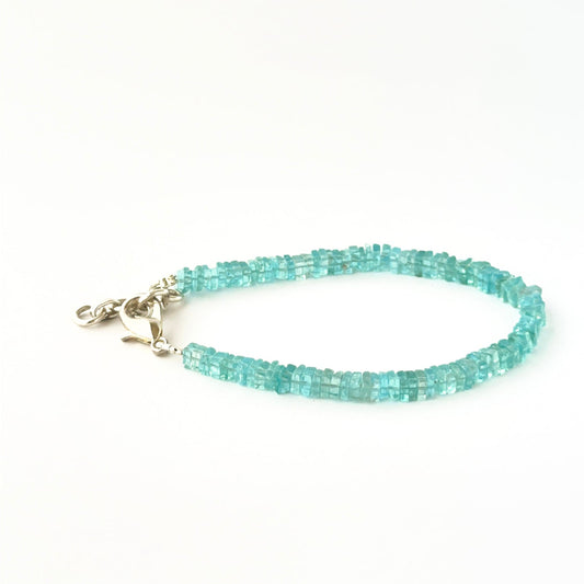 Square heishi apatite bead bracelet crafted in a classic 18cm adjustable style.