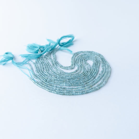 Apatite faceted rondelle beads with vibrant shine, ideal for DIY jewellery makers using authentic gemstone beads.