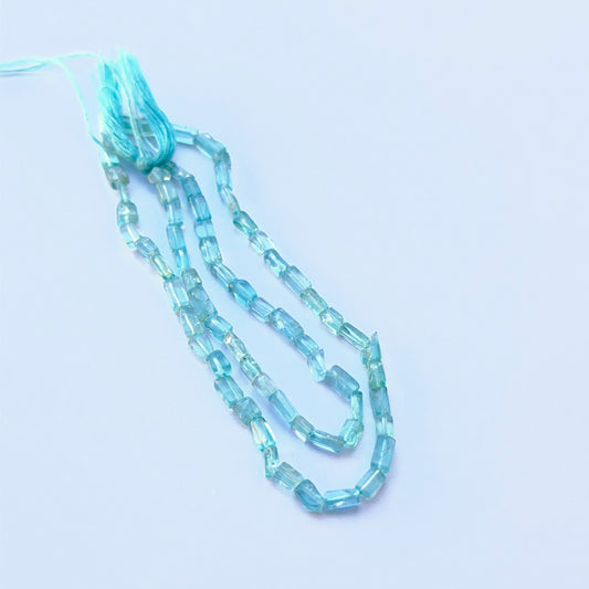 Close‑up of 3mm Apatite stone beads showing polished surfaces and clean rectangular cuts ideal for natural gemstone beads for DIY jewellery.