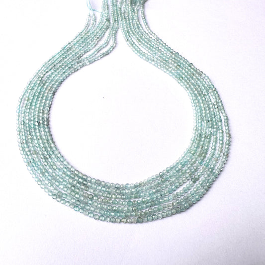 Ocean-blue Aquamarine rondelle beads neatly strung on a 33cm jewellery strand.