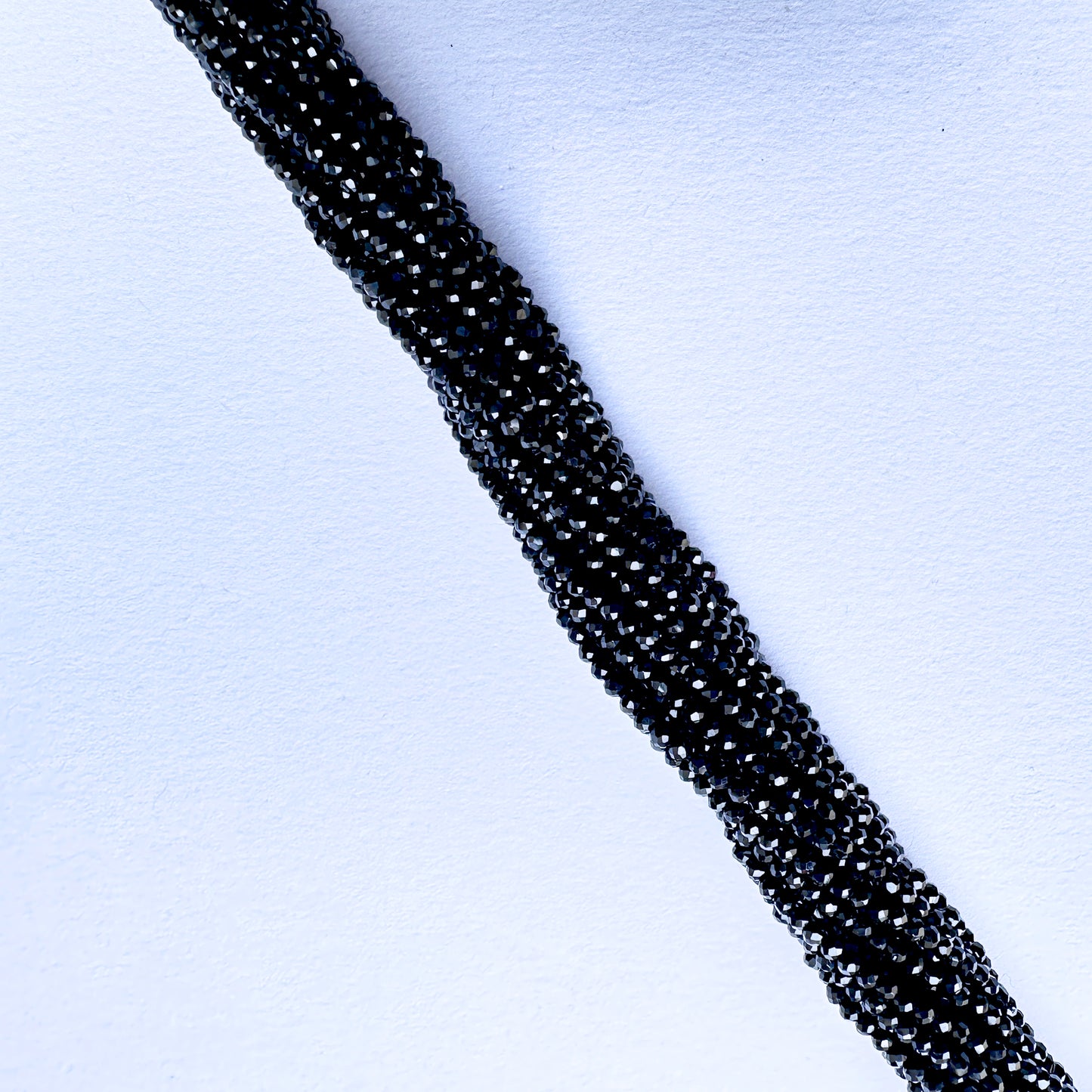 Stone Beads in Black Spinel with refined faceted rondelle cut for handmade jewellery components.