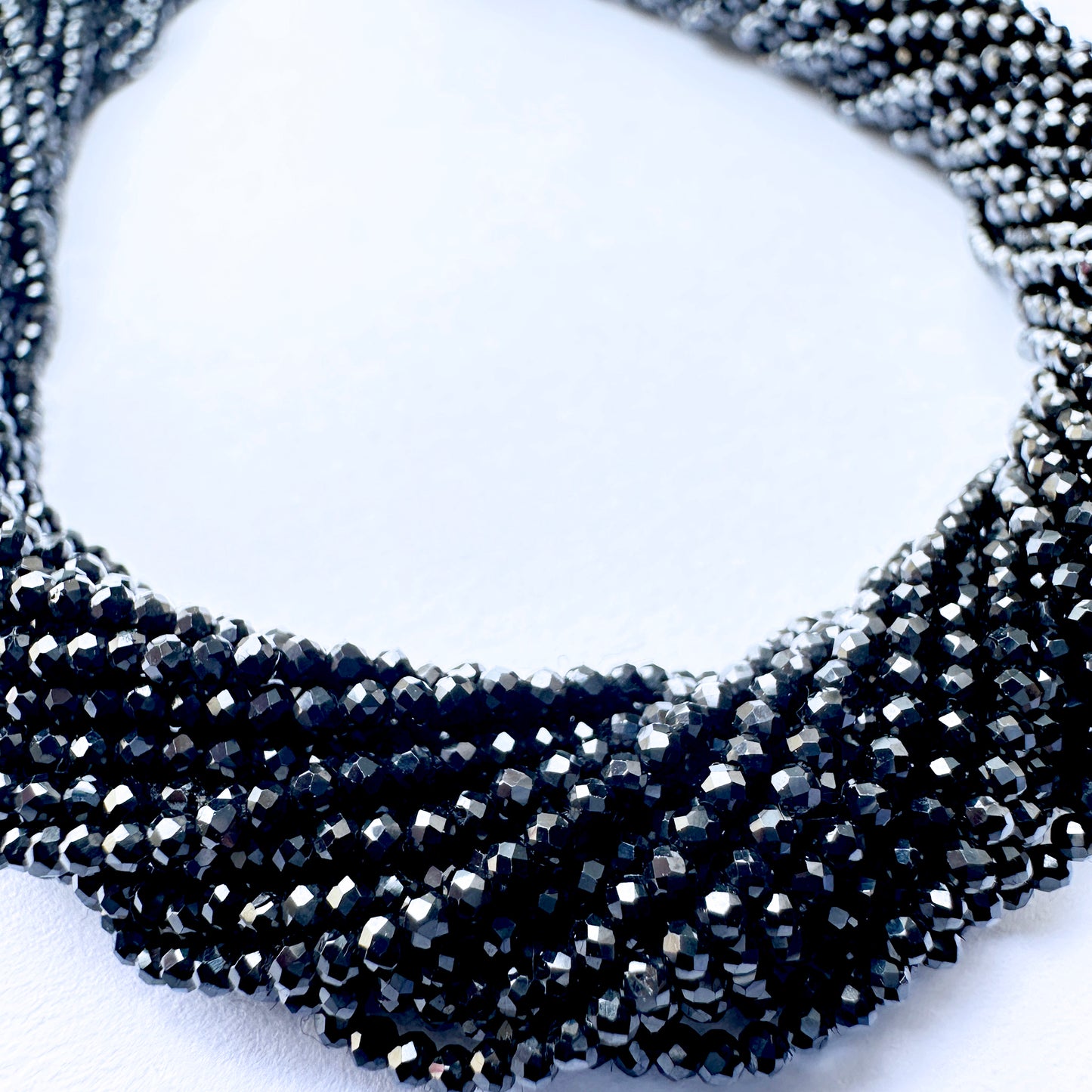 Natural gemstone beads in Black Spinel, 1.7-1.9mm size, ideal for elegant DIY jewellery designs.