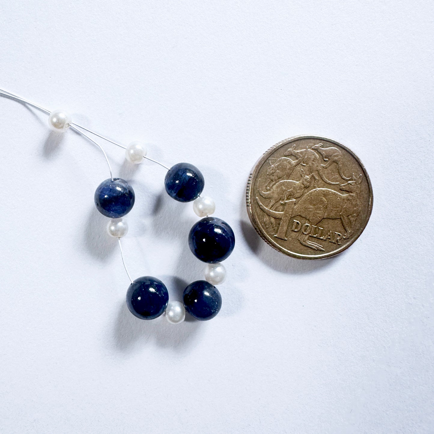Stone Beads for DIY jewellery featuring Blue Sapphire and Pearls with consistent round shape and clarity.