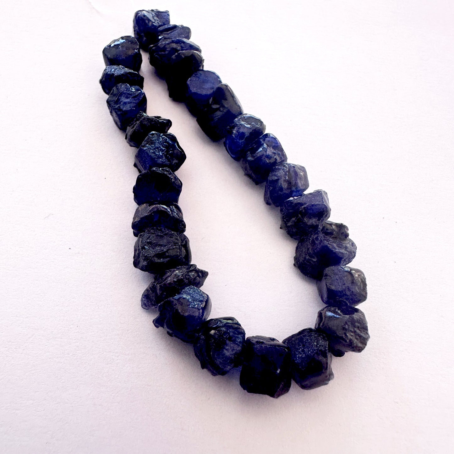 Blue sapphire beads with 0.5mm holes, perfect for durable stringing and bold jewellery styles.
