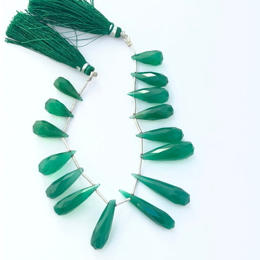 Hand‑selected green Chalcedony gemstone beads with crisp faceting and elegant elongated shapes.