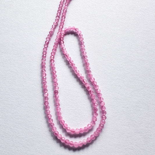 Stone beads with faceted Chalcedony arranged neatly, ideal for handmade jewellery components.