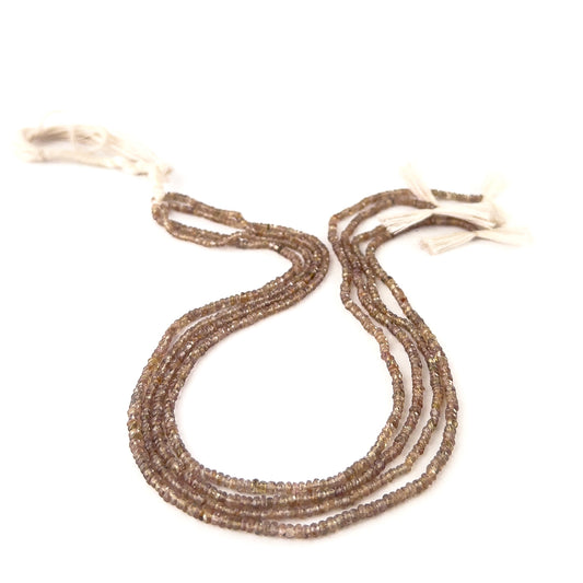 Change Garnet gemstone rondelles in 3mm size, offering rich colour variation and polished faceting across a 35cm strand.