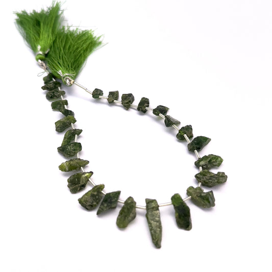 Natural Chrome Diopside stone beads arranged in a set of 26 with earthy character.