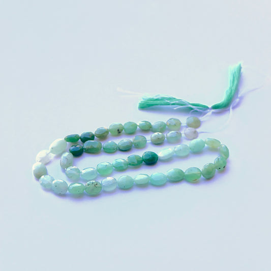 Close‑up of Chrysoprase stone beads showing polished facets and 7.8–8.2mm sizing ideal for natural gemstone beads for DIY jewellery.