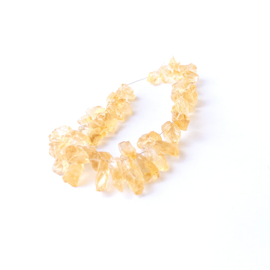 Genuine Citrine gemstone beads showcasing raw organic form, bright colour and handmade jewellery quality.