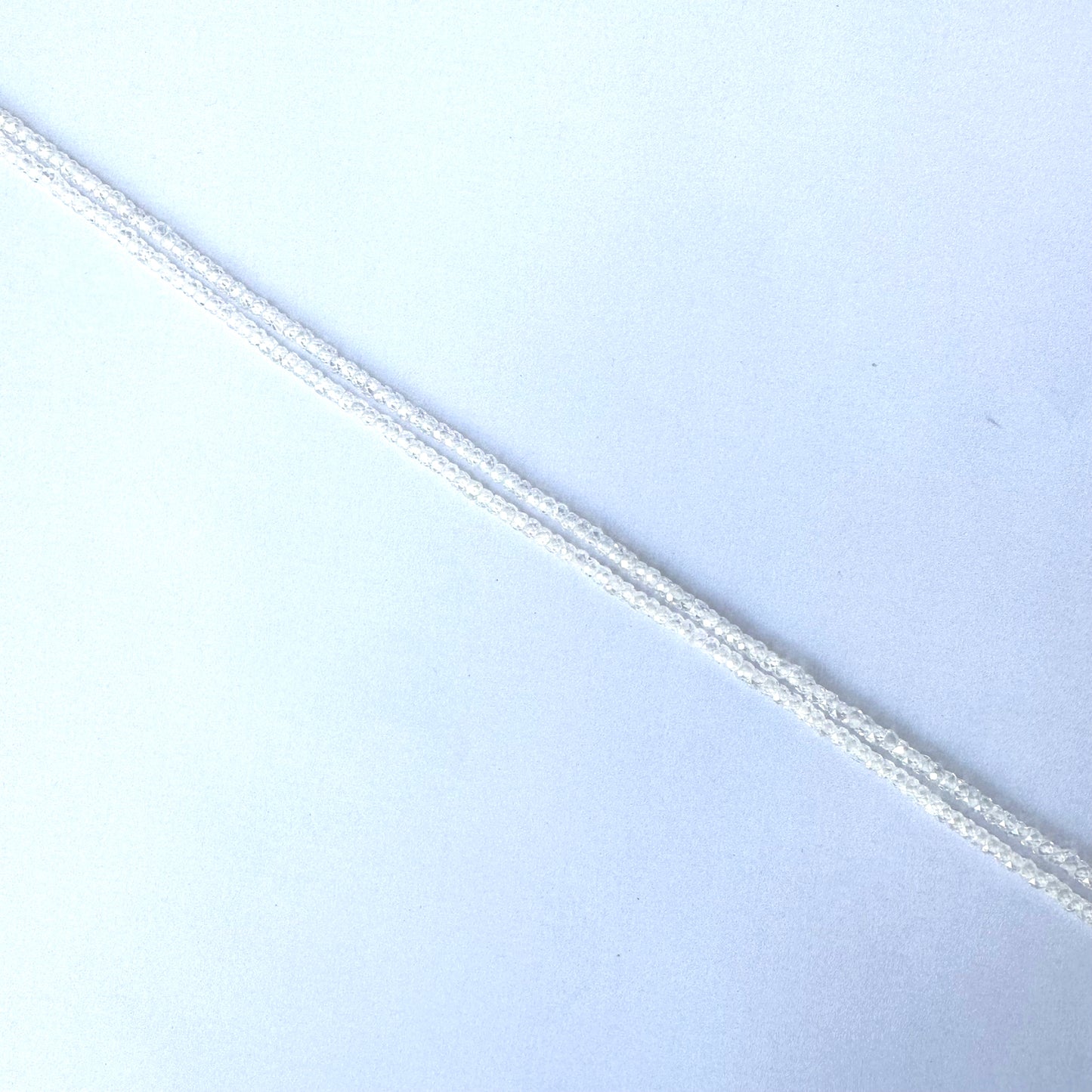 High-quality Cubic Zirconia rondelles with 0.4mm bead holes and radiant finish.
