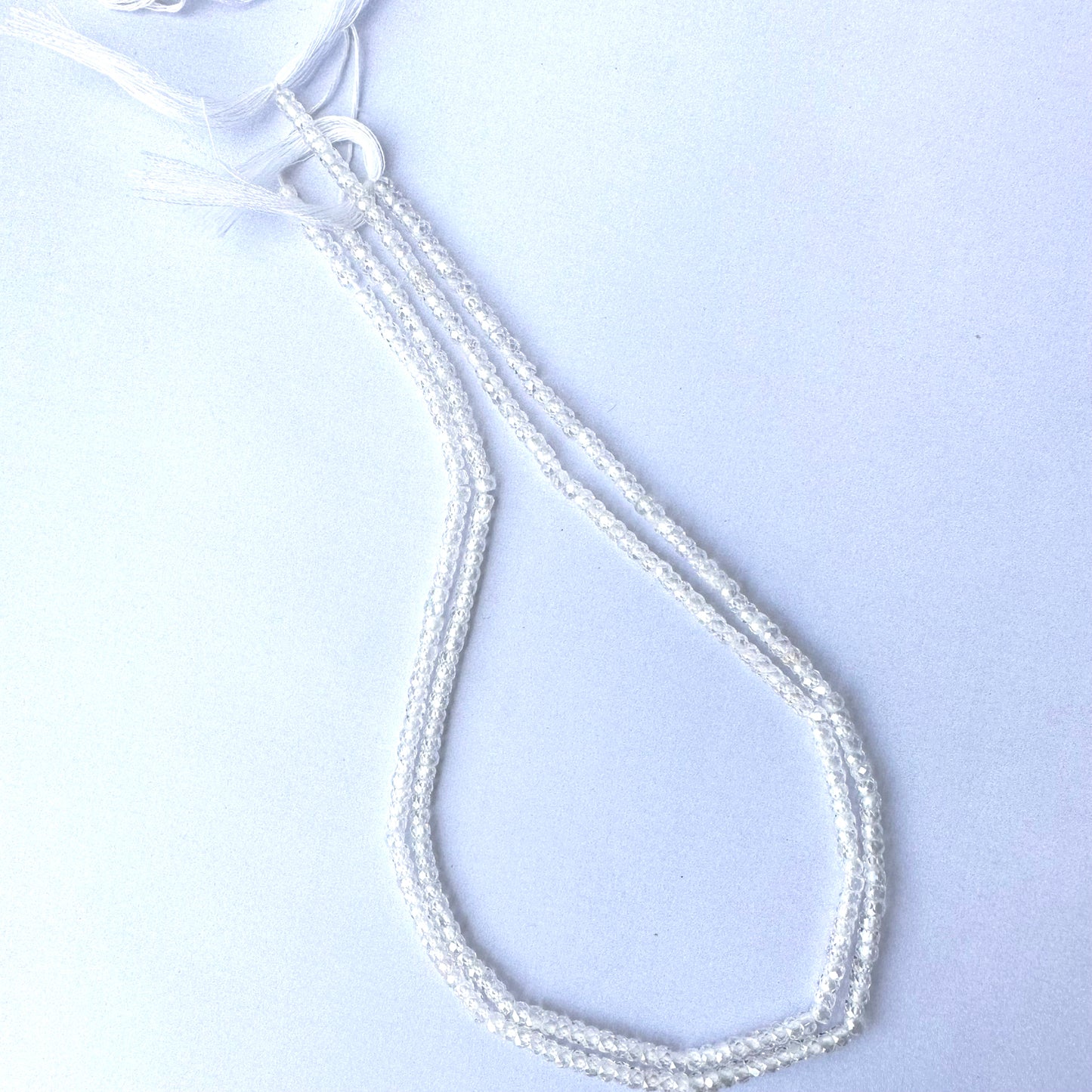 Cubic Zirconia beads arranged in a 33cm strand with consistent cut and clarity.