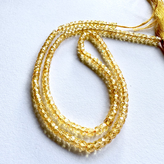 Bright Yellow Cubic Zirconia rondelle beads ideal for vibrant jewellery designs.
