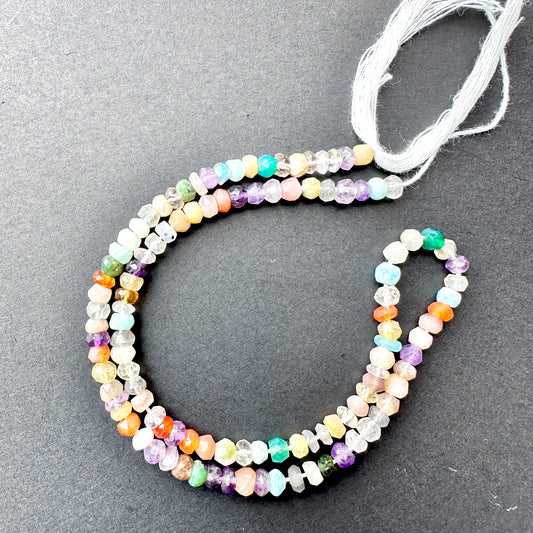 Close-up of Disco stone beads showing faceted cut and natural gemstone shine.