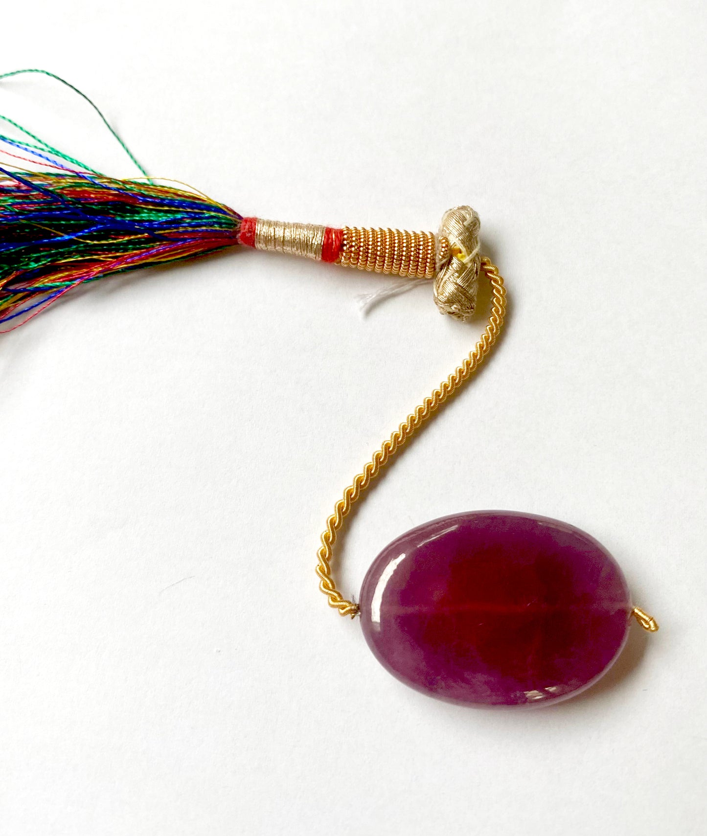 Drilled Ruby gemstone pendant with elegant oval silhouette and high-quality craftsmanship.