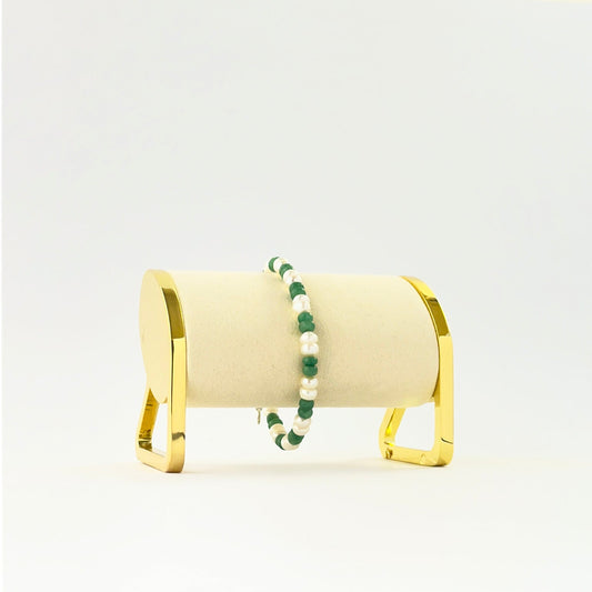 Elegant emerald and freshwater pearl bracelet crafted with smooth rondelle beads.