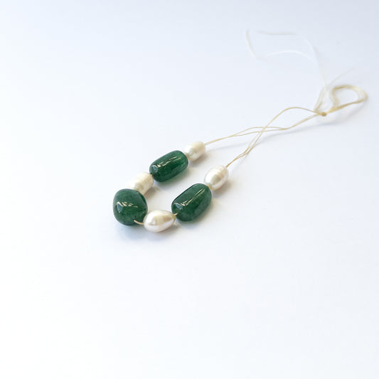 Natural Emerald and pearl beads with soft shine and smooth tumble shapes, ideal for artisan jewellery components.