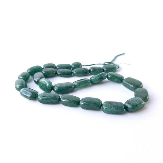 Genuine Emerald gemstone beads with polished tumble shapes, ideal for DIY jewellery and artisan beadwork.