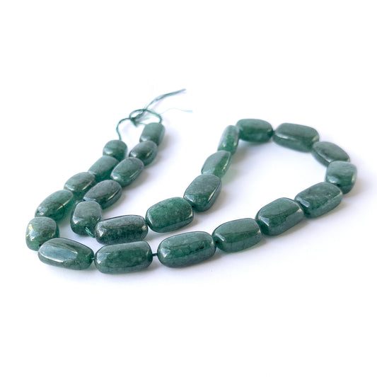 Authentic Emerald stone beads showcasing deep green tones and smooth tumble finish for jewellery designers.