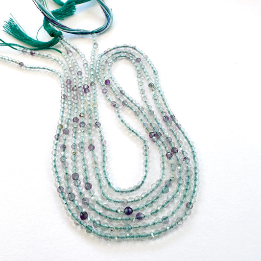Natural gemstone beads in Fluorite, arranged on a 32cm strand with consistent cut.