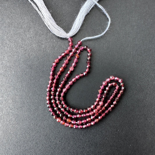 Stone beads for DIY jewellery featuring faceted rondelle cut and rich colour ideal for elegant design projects.