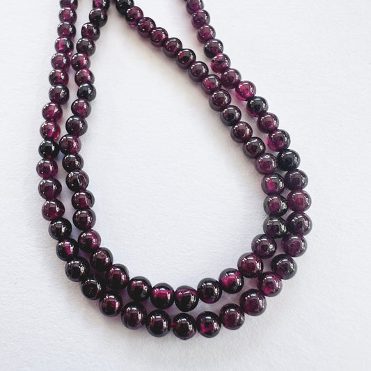 Natural gemstone beads in Garnet, arranged on a 34cm strand with consistent shape.