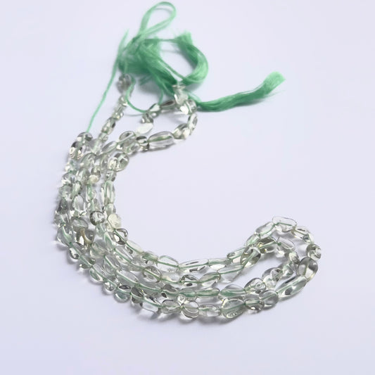 Natural gemstone beads for DIY jewellery, Green Amethyst tumbles with luminous green hues.