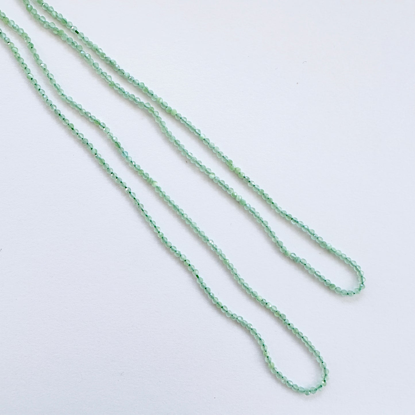 Green Chalcedony stone beads with precise faceted rondelle cut and premium polish.