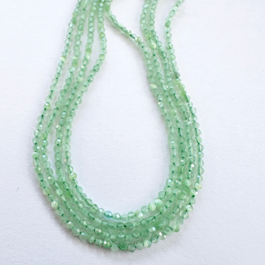 Natural gemstone beads in Green Chalcedony, arranged on a 37cm strand with consistent cut.