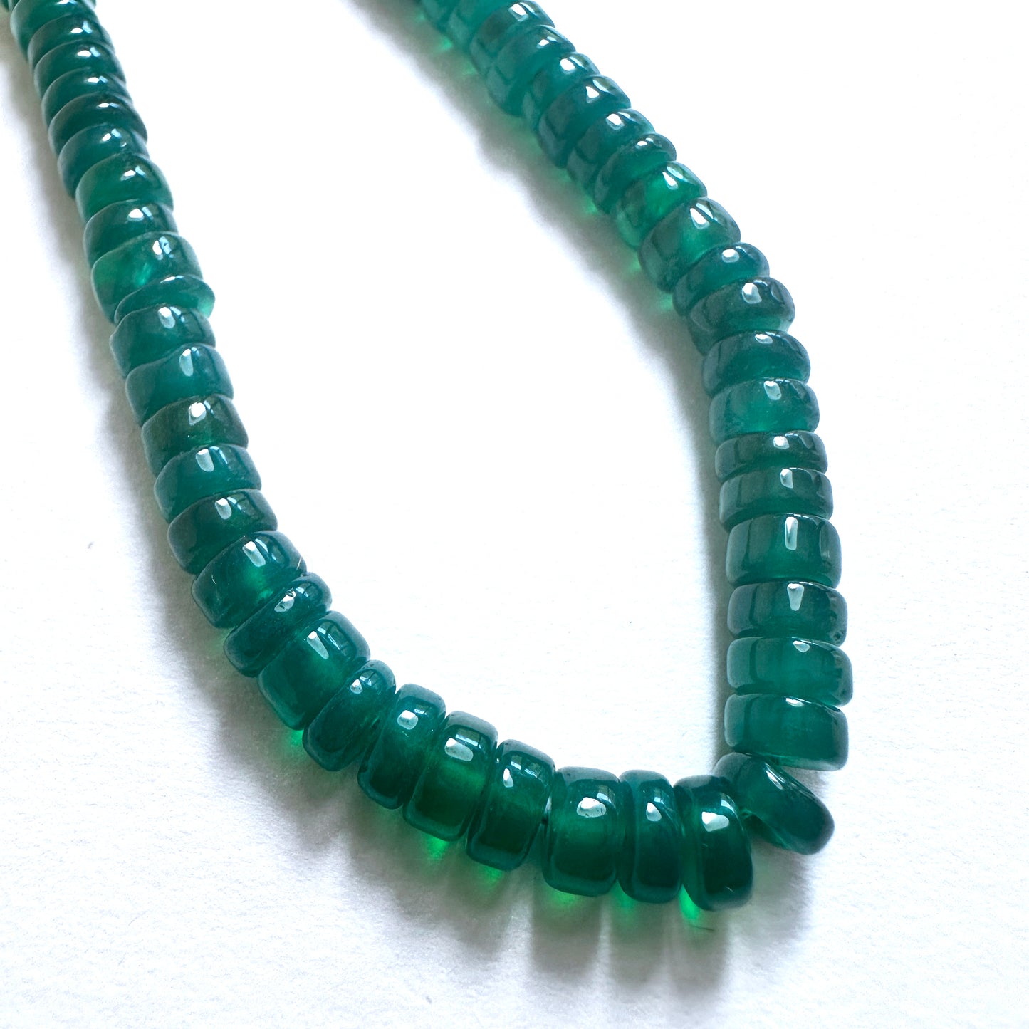 Handmade jewellery components with Green Onyx beads arranged in a 20cm strand, ideal for stylish and versatile designs.