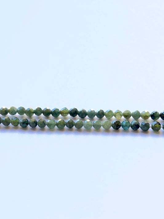 Green Tourmaline faceted sphere 3.5mm beads on a 32cm strand showing vivid green sparkle for jewellery making.