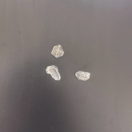 Herkimer undrilled nuggets with icy clarity and natural double-terminated points, sized 9-12mm.