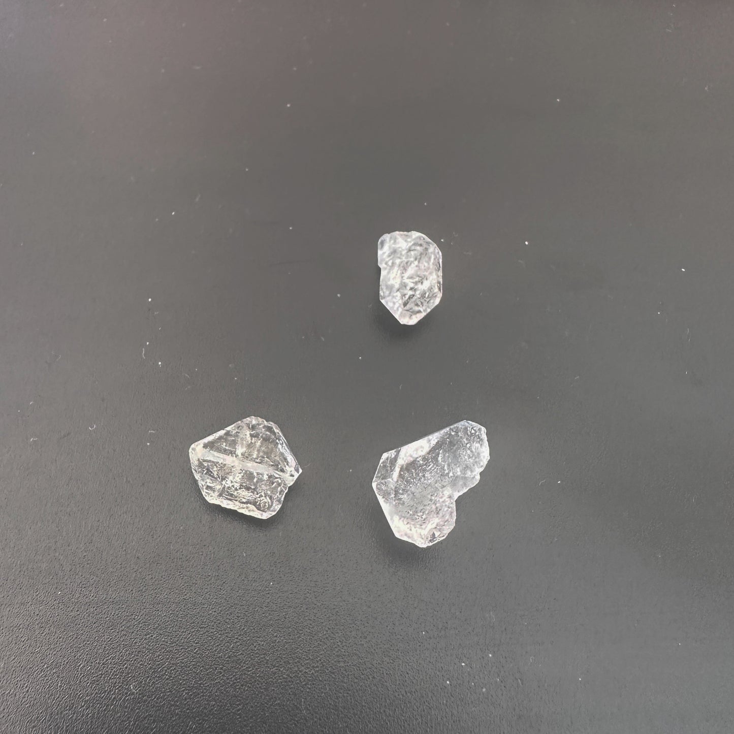 Close-up of raw Herkimer crystals showing brilliant shine and organic formation.