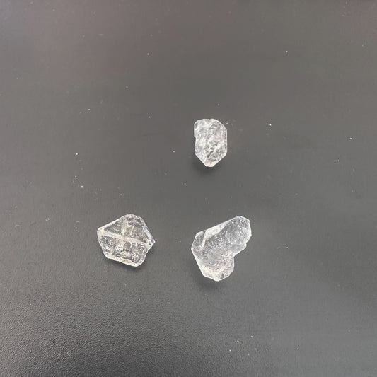 Close-up of raw Herkimer crystals showing brilliant shine and organic formation.