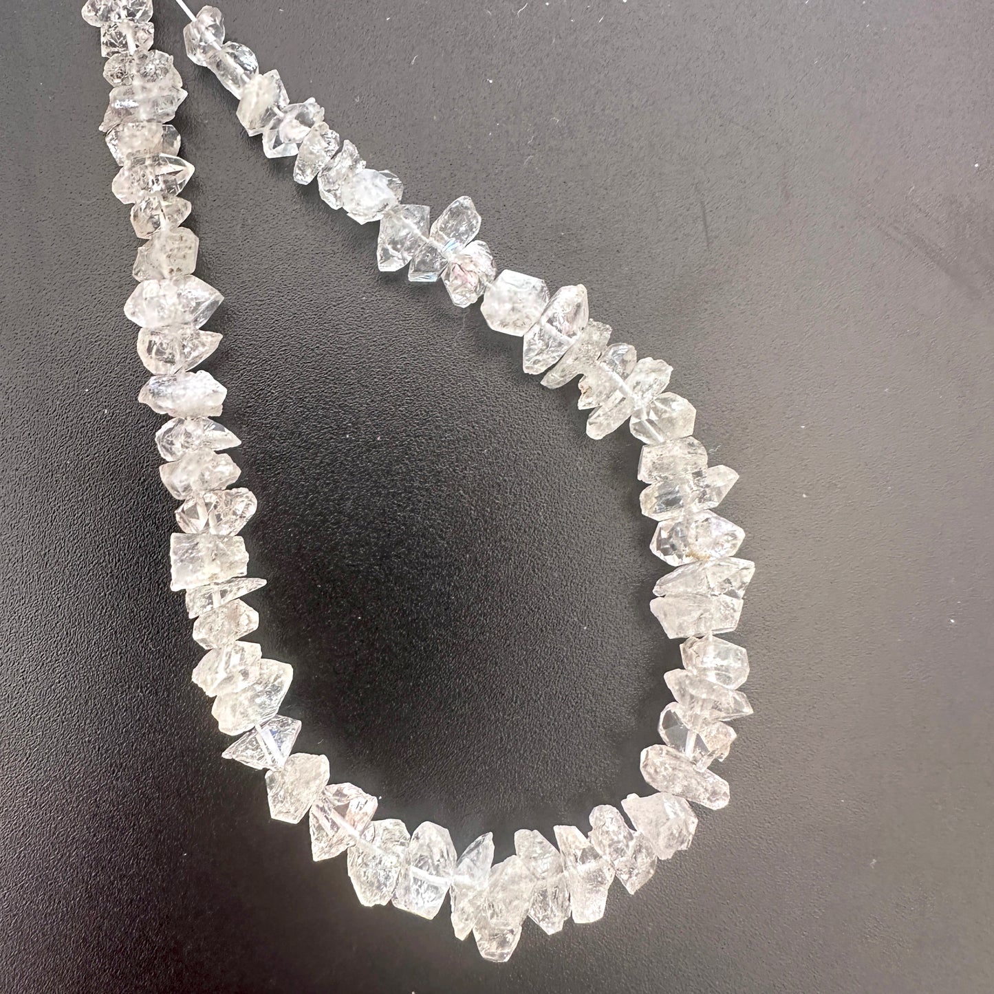 Centre-drilled Herkimer gemstones with double-terminated points and radiant spar