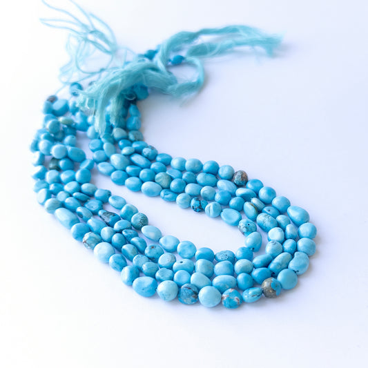 Authentic Howlite Turquoise stone beads with smooth tumble cut, ideal for DIY jewellery makers seeking quality gemstone components.