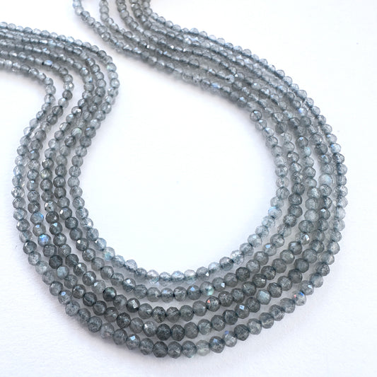 Natural gemstone beads in Labradorite, neatly arranged on a 32cm strand.