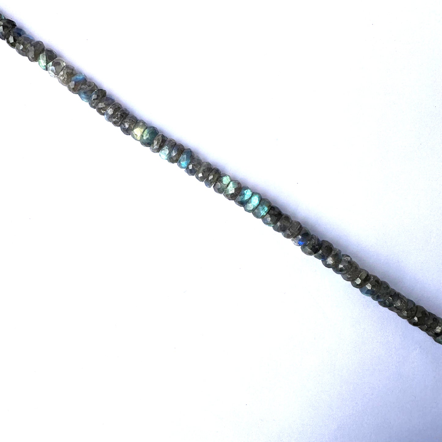 High-quality Labradorite rondelles with 0.5mm bead holes and radiant surface shine.