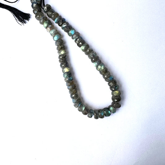 Labradorite gemstone beads arranged in a 26cm strand with consistent cut and polish.