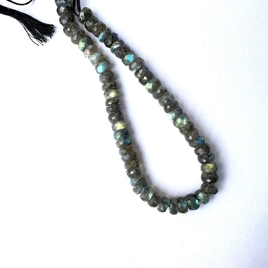 Labradorite gemstone beads arranged in a 26cm strand with consistent cut and polish.