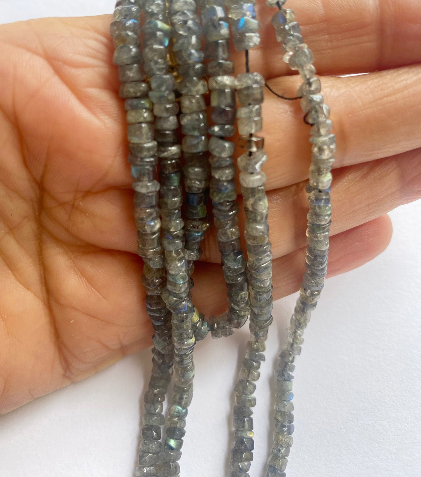 High-quality Labradorite beads featuring a soft sheen and mesmerizing play of colors.