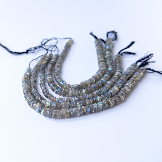 Genuine Labradorite stone beads in smooth wheel cut with blue‑grey flashes, ideal for DIY jewellery making.