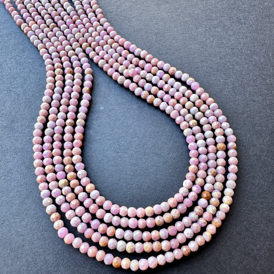 Close-up of 2.2mm Lavender Opal stone beads with soft shine and precision cut, ideal for handmade jewellery components.