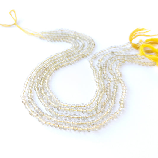 Genuine Lemon Quartz stone beads for DIY jewellery featuring polished round shaping and fresh citrus colour.